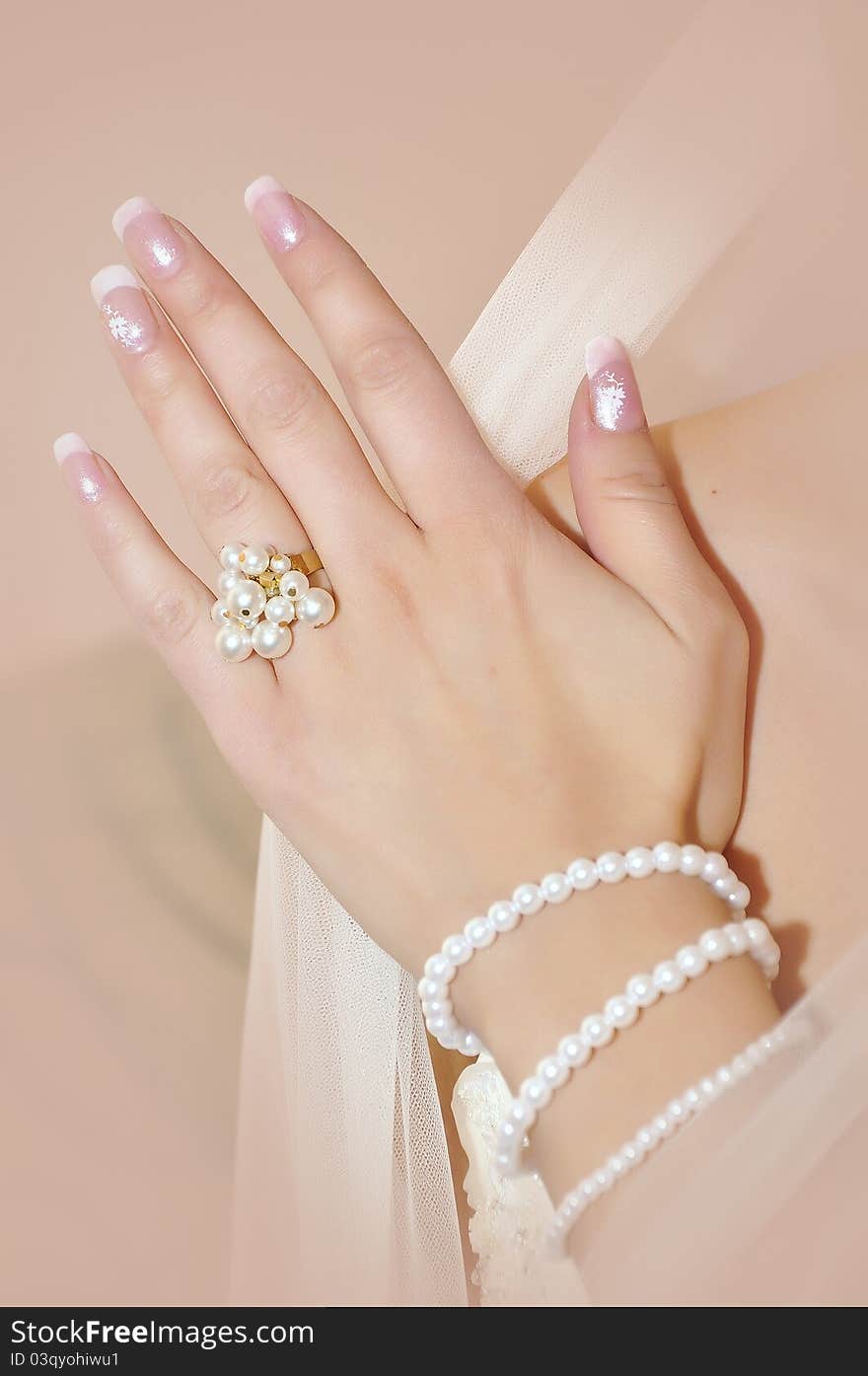 Bride hand with ring and bracelet