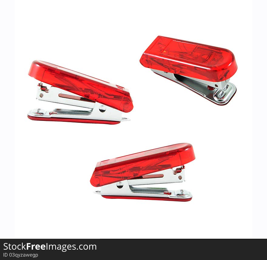 Red stapler on white isolate. Red stapler on white isolate