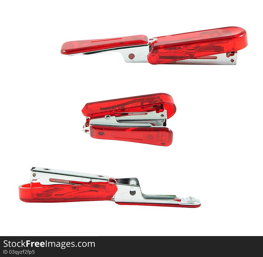 Red stapler on white isolate. Red stapler on white isolate