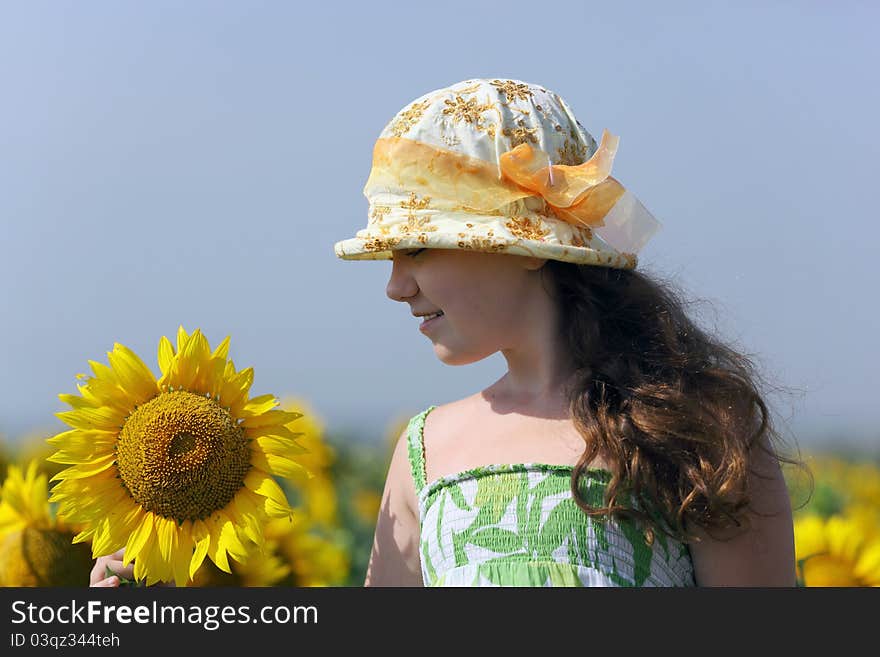 The Little girl and Sunflowers