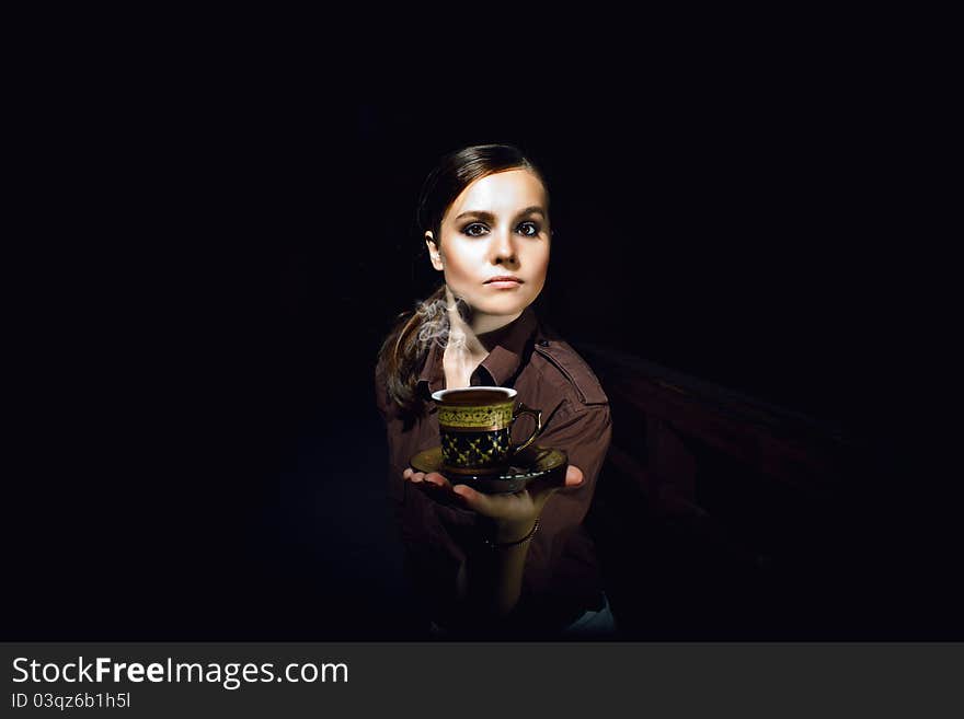 Young beautiful lady drinking coffee