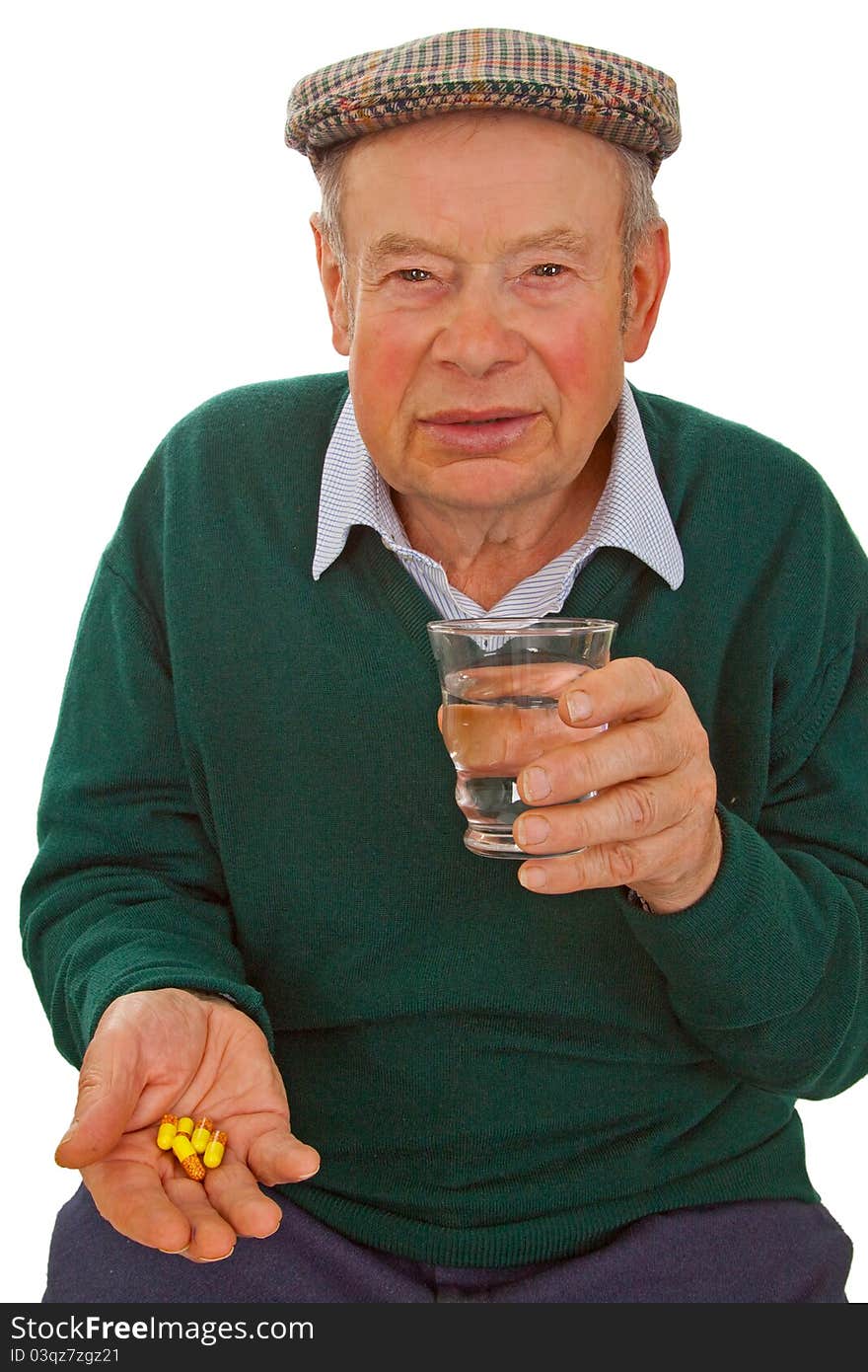 Male senior taking medicine isolated on white background