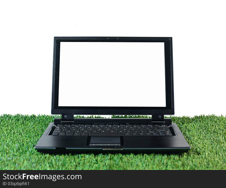 A laptop computer on a work desk