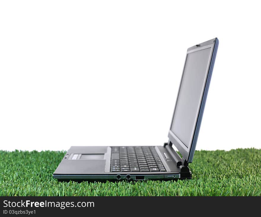 A laptop computer on a work desk