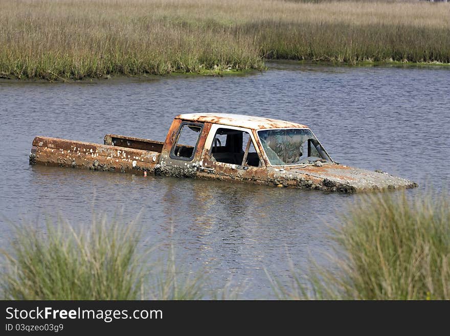 Deep in southern Louisiana, I came across this truck in the water which was more than likely a victim of Hurricane Katrina.