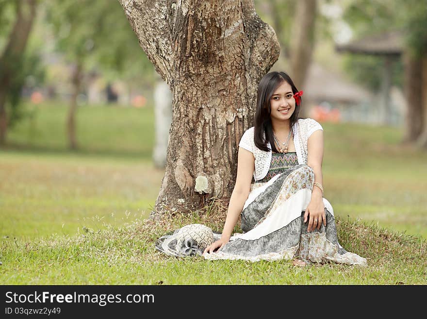 A portrait of a beautiful young asian woman outdoor