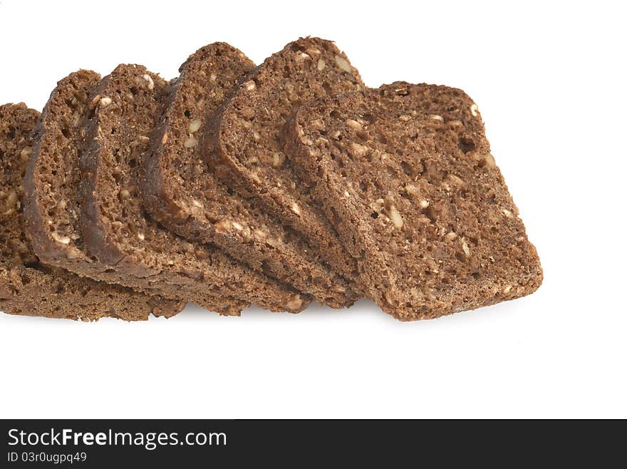 Closeup of sliced bread on white background. Closeup of sliced bread on white background.