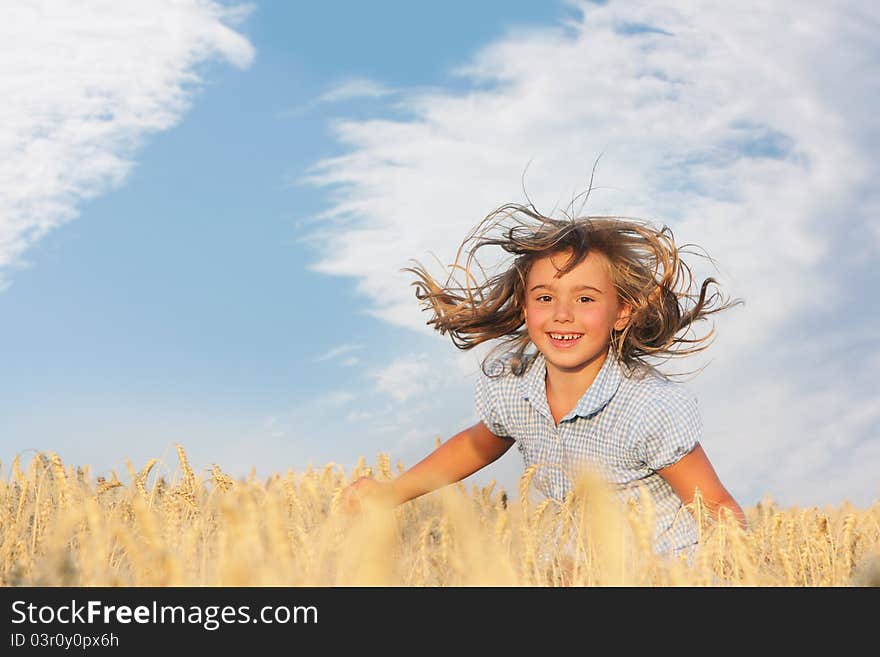 Happy young girl on natural background