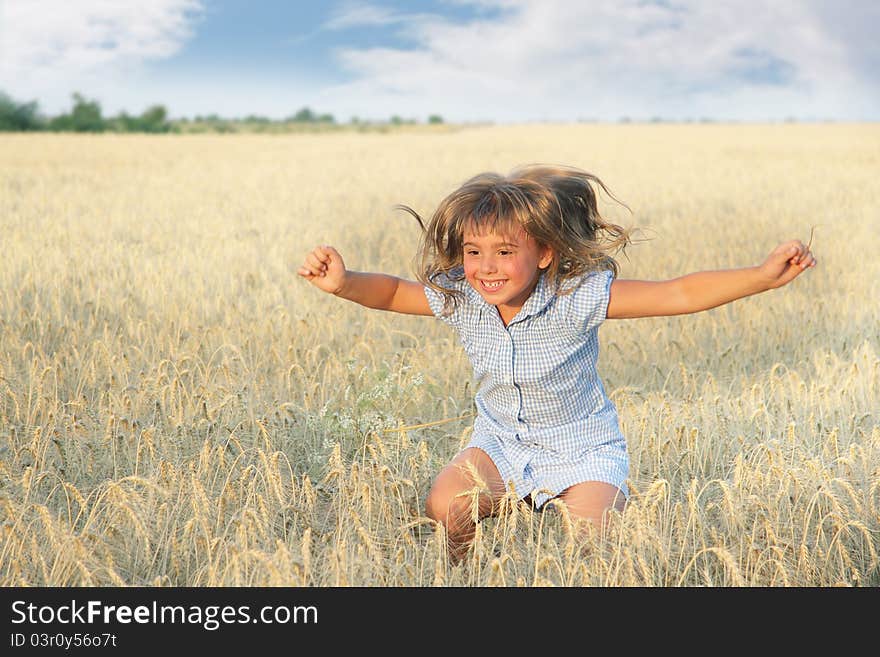 Happy young girl in yellow field. Happy young girl in yellow field