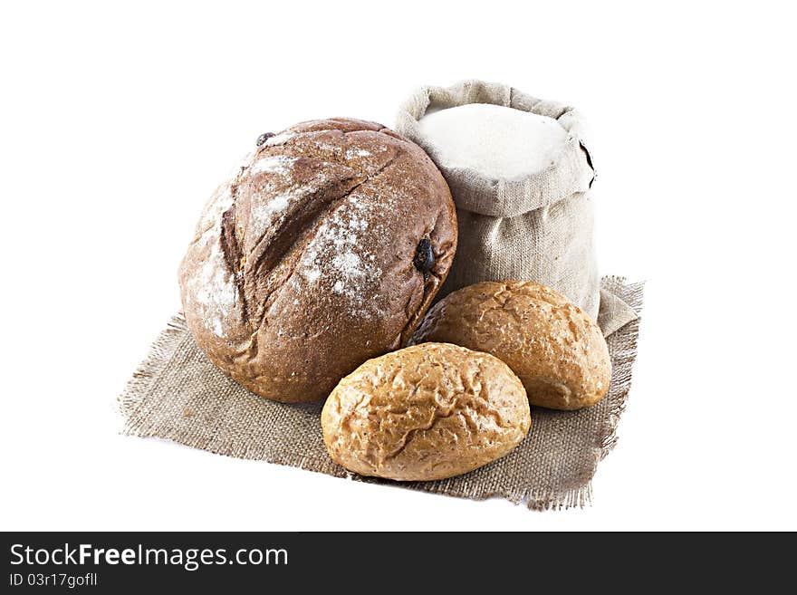 Loaves of bread isolated over white background