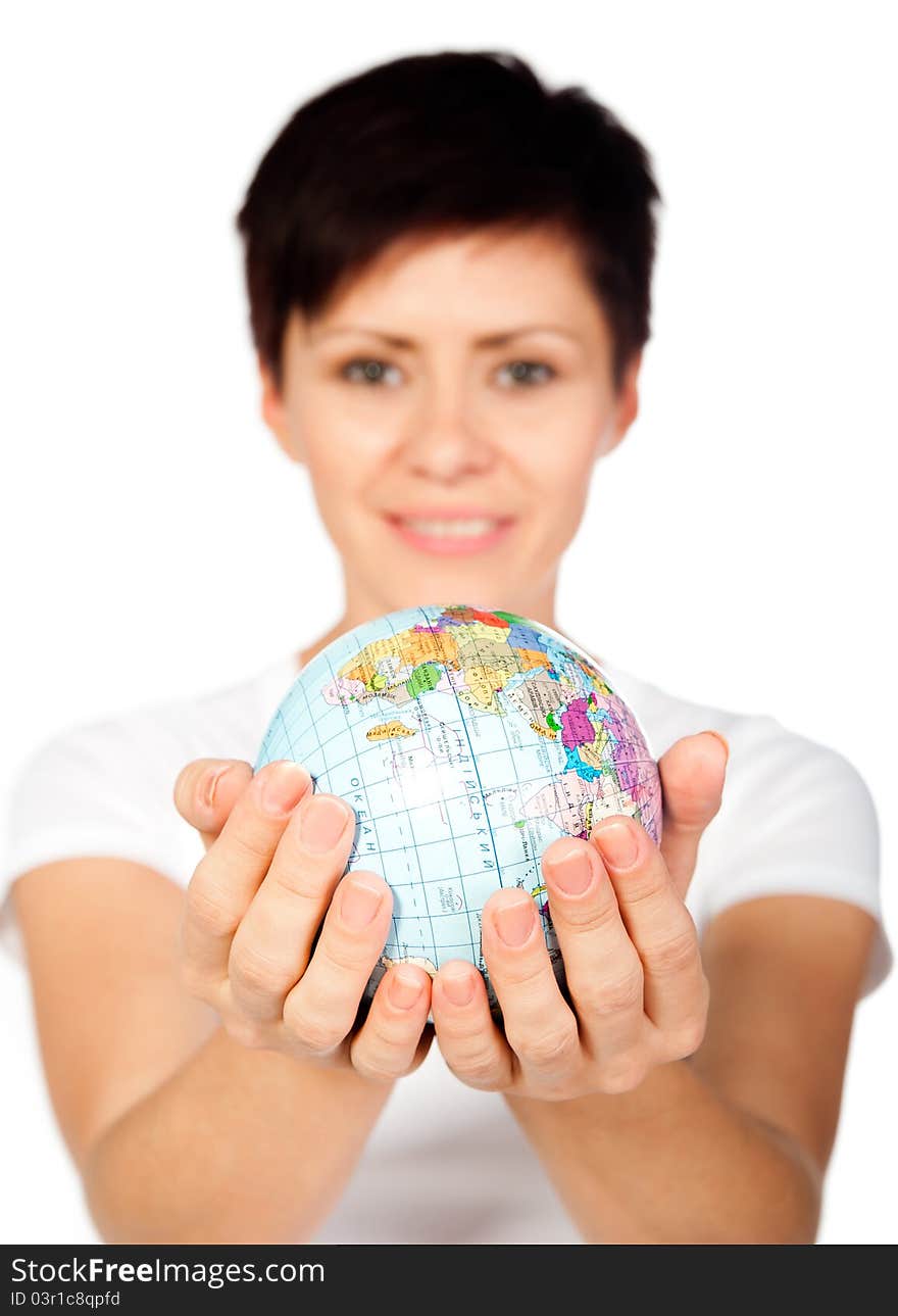 Girl with globe isolated on white background