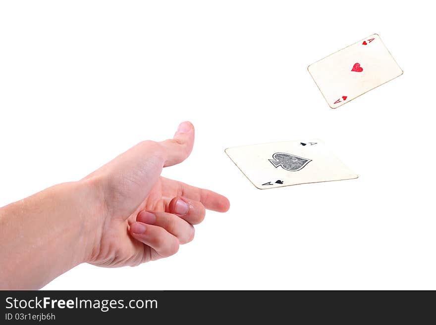 Hand throwing two aces on white background