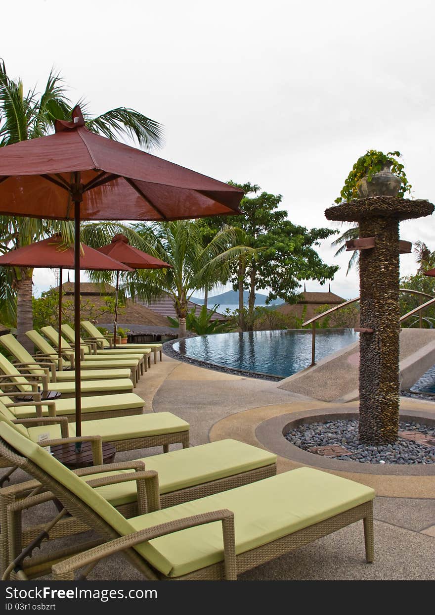 Beach chairs and  umbrella