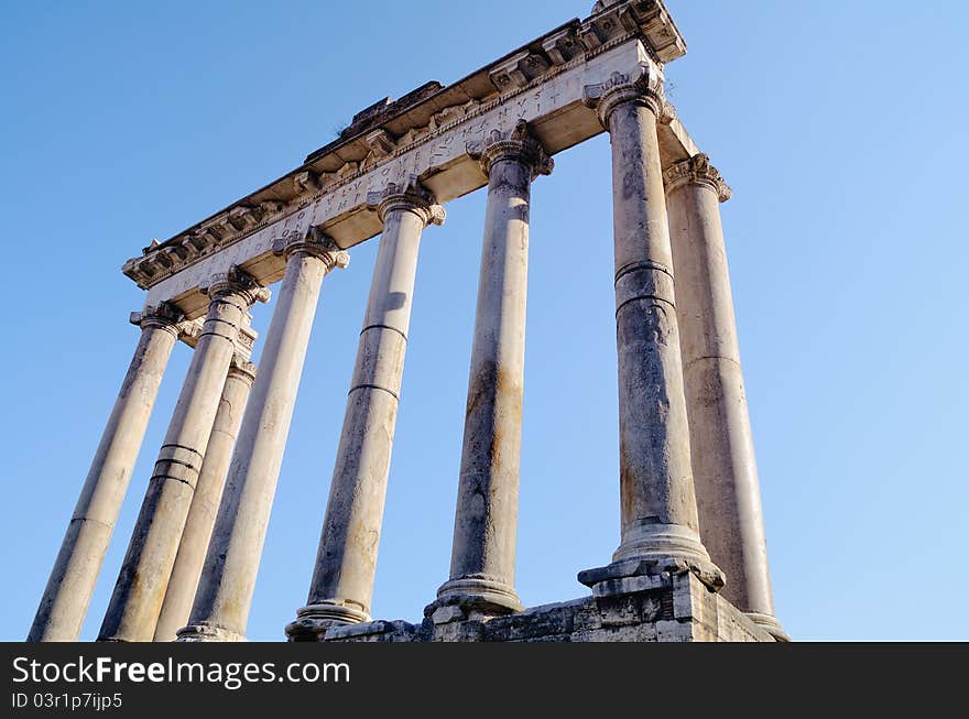 Ancient classical column Portico against a blue sky. Rome, Italy