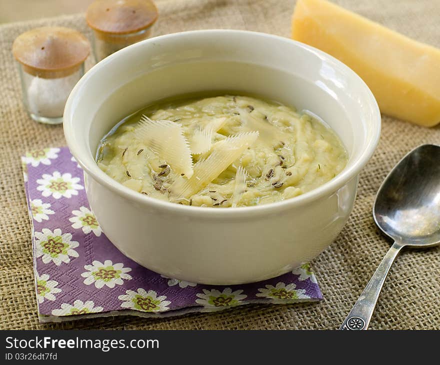 Delicious vegetable soup with cheese. Selective focus