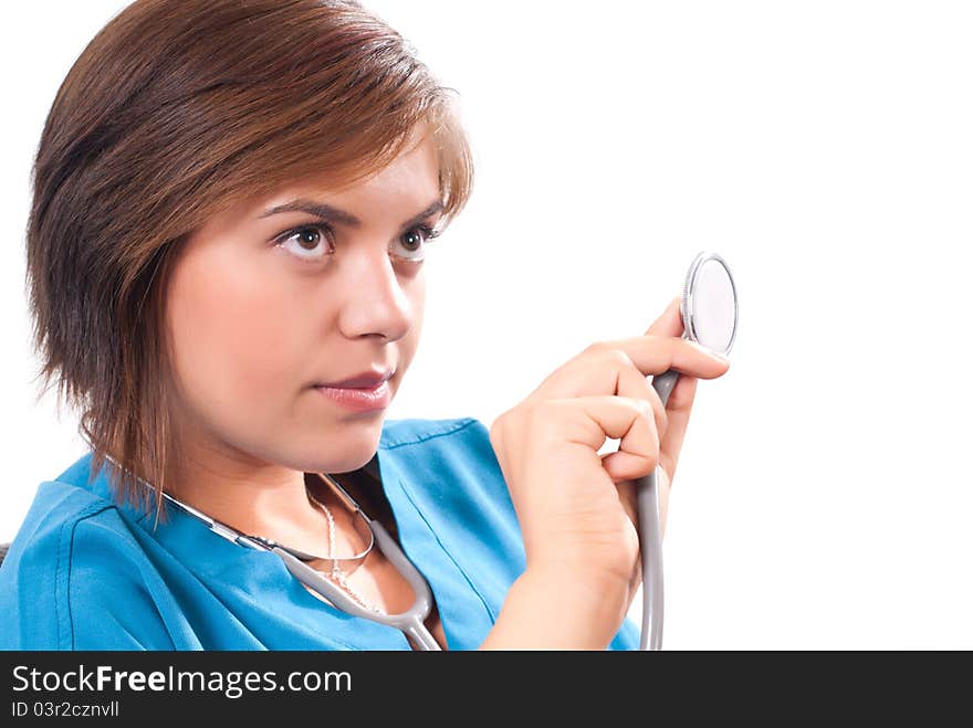 Medical doctor with stethoscope on white background