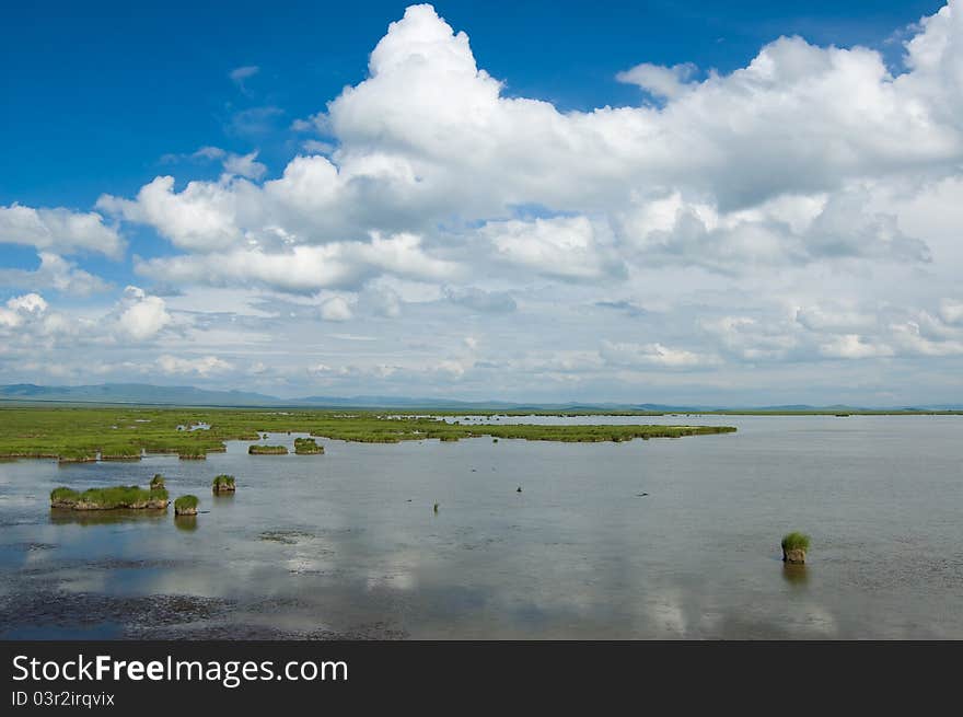 Huahu lake and plateau wetland, it is the beautiful natural scenery of qinghai-tibet plateau, Gansu China. Qinghai-tibet plateau is the highest and biggest plateau in the world. Huahu lake and plateau wetland, it is the beautiful natural scenery of qinghai-tibet plateau, Gansu China. Qinghai-tibet plateau is the highest and biggest plateau in the world.