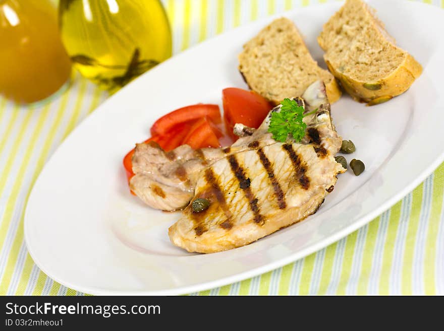 Pork Chop, Grilled ,with Salad,bun And Tomato