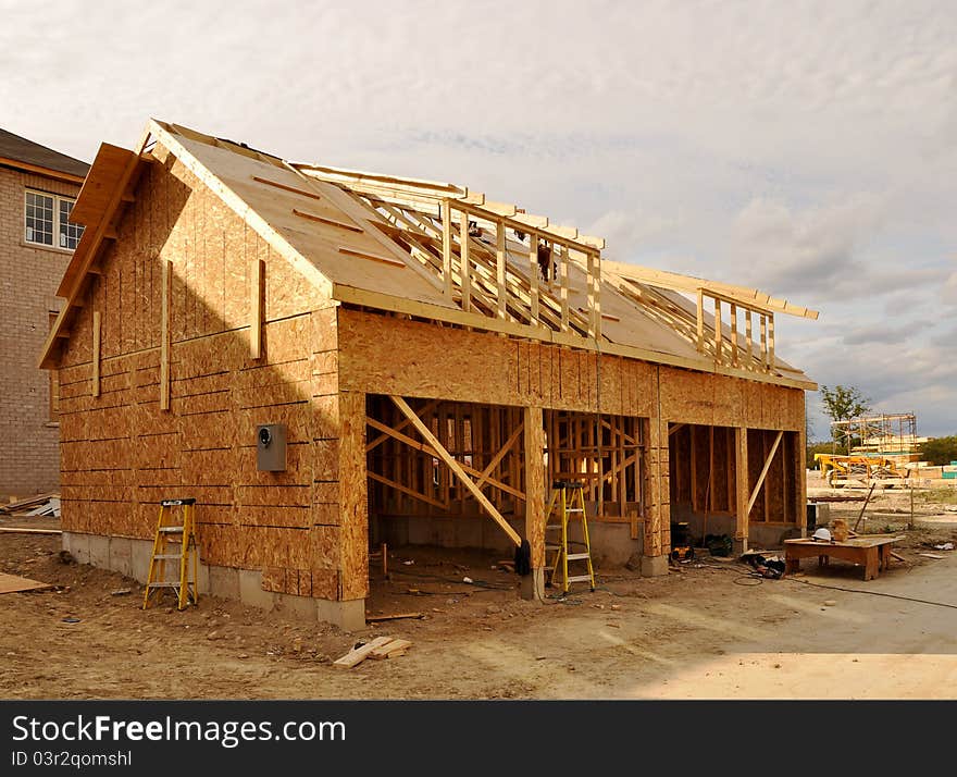 Building site with partially completed new homes. Building site with partially completed new homes