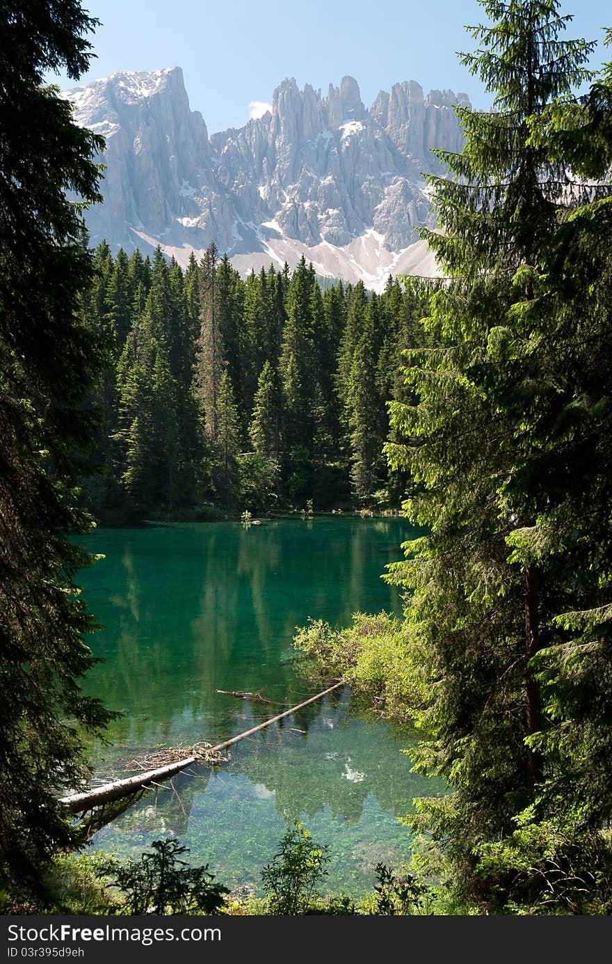 Lake caress with dolomites reflected. Lake caress with dolomites reflected