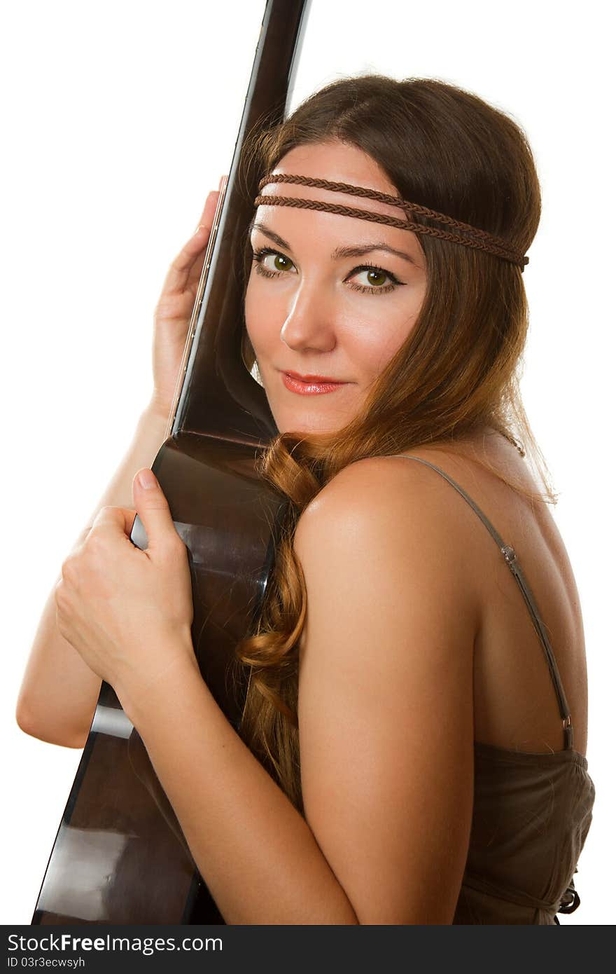 Beautiful woman with bandage on his head and a guitar on a white background. Beautiful woman with bandage on his head and a guitar on a white background