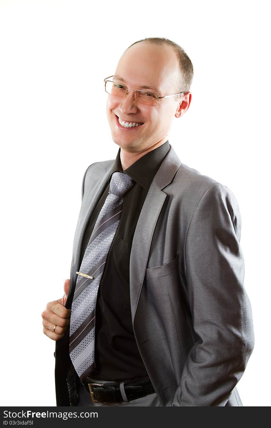 Man in a suit laughing cheerfully on a white background. Man in a suit laughing cheerfully on a white background