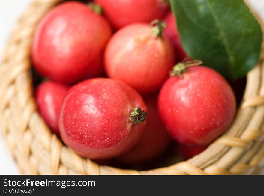 Small red apples in the basket