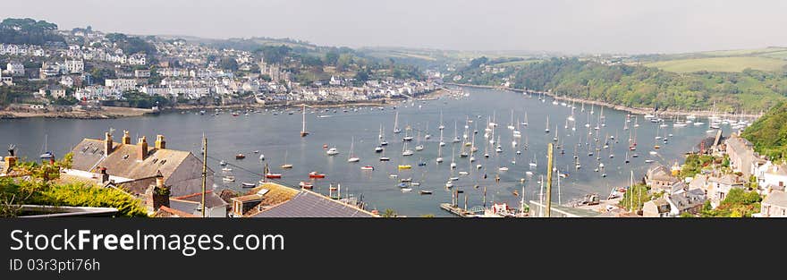 A panoramic image of the landscape of Polruan in Cornwall, England.