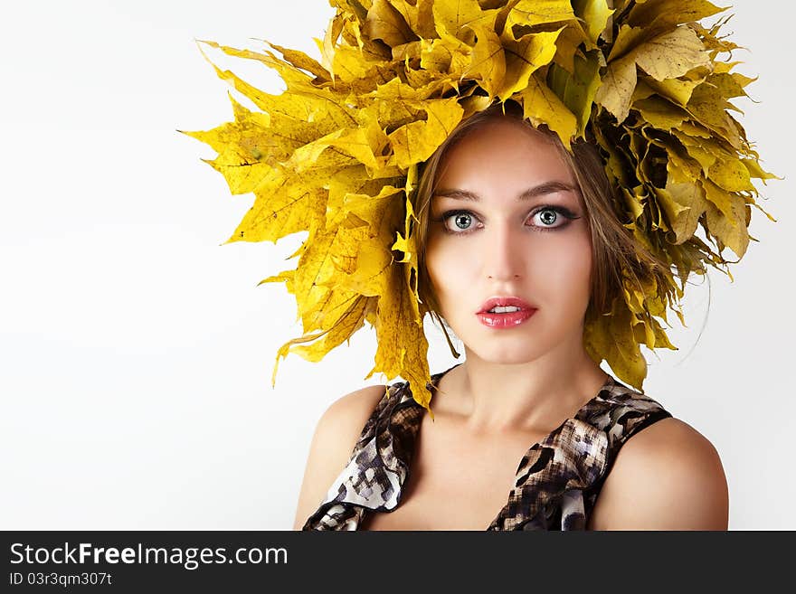 At the woman an autumn wreath on a head. At the woman an autumn wreath on a head.