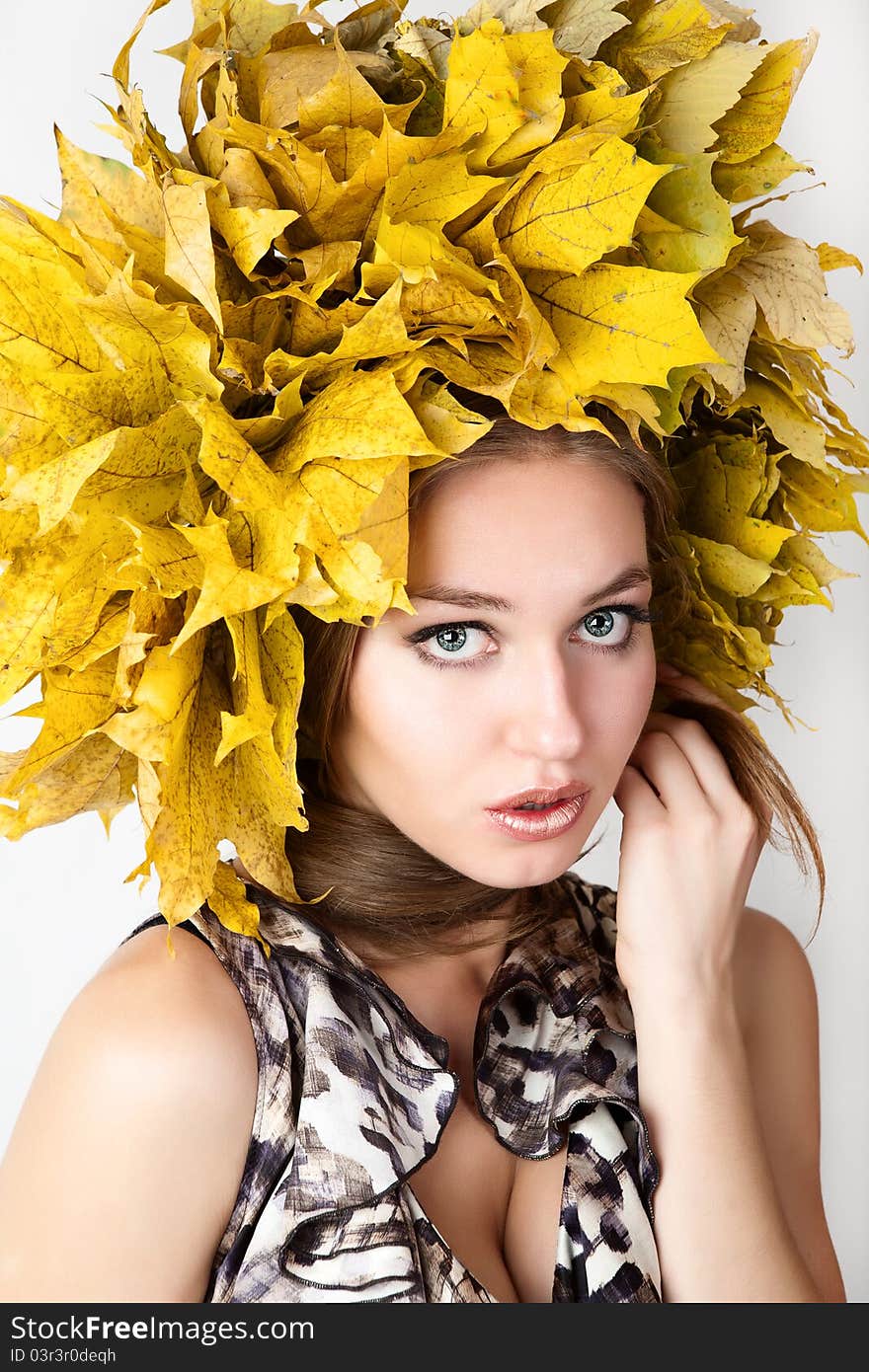 At the woman an autumn wreath on a head. At the woman an autumn wreath on a head.