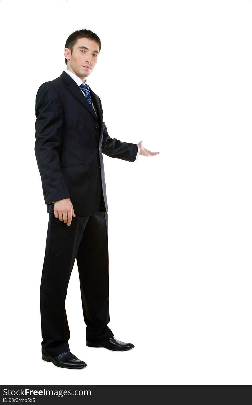 Businessman with arm out in a welcoming gesture