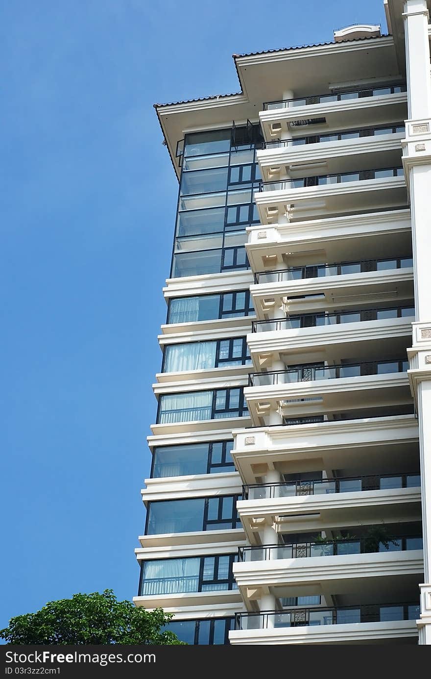 Exterior of the apartments house with blue sky