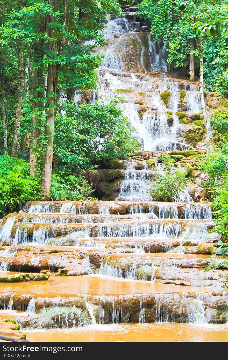 Water fall to the river step by step.