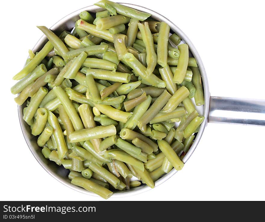 Color photo of green beans in a metal pan. Color photo of green beans in a metal pan