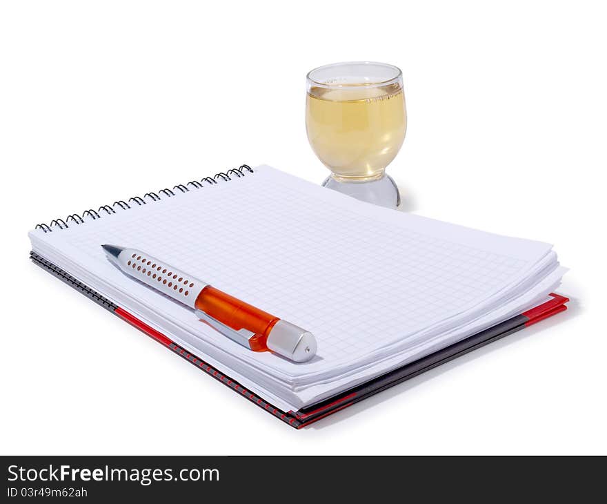 Color photo of glasses cup and empty notebook. Color photo of glasses cup and empty notebook