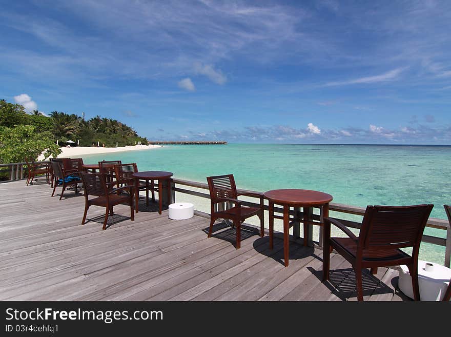 Chairs and desk near the beach, Maldives