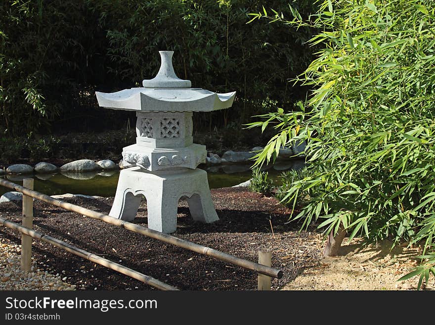 Details of a japanese lantern in zen garden