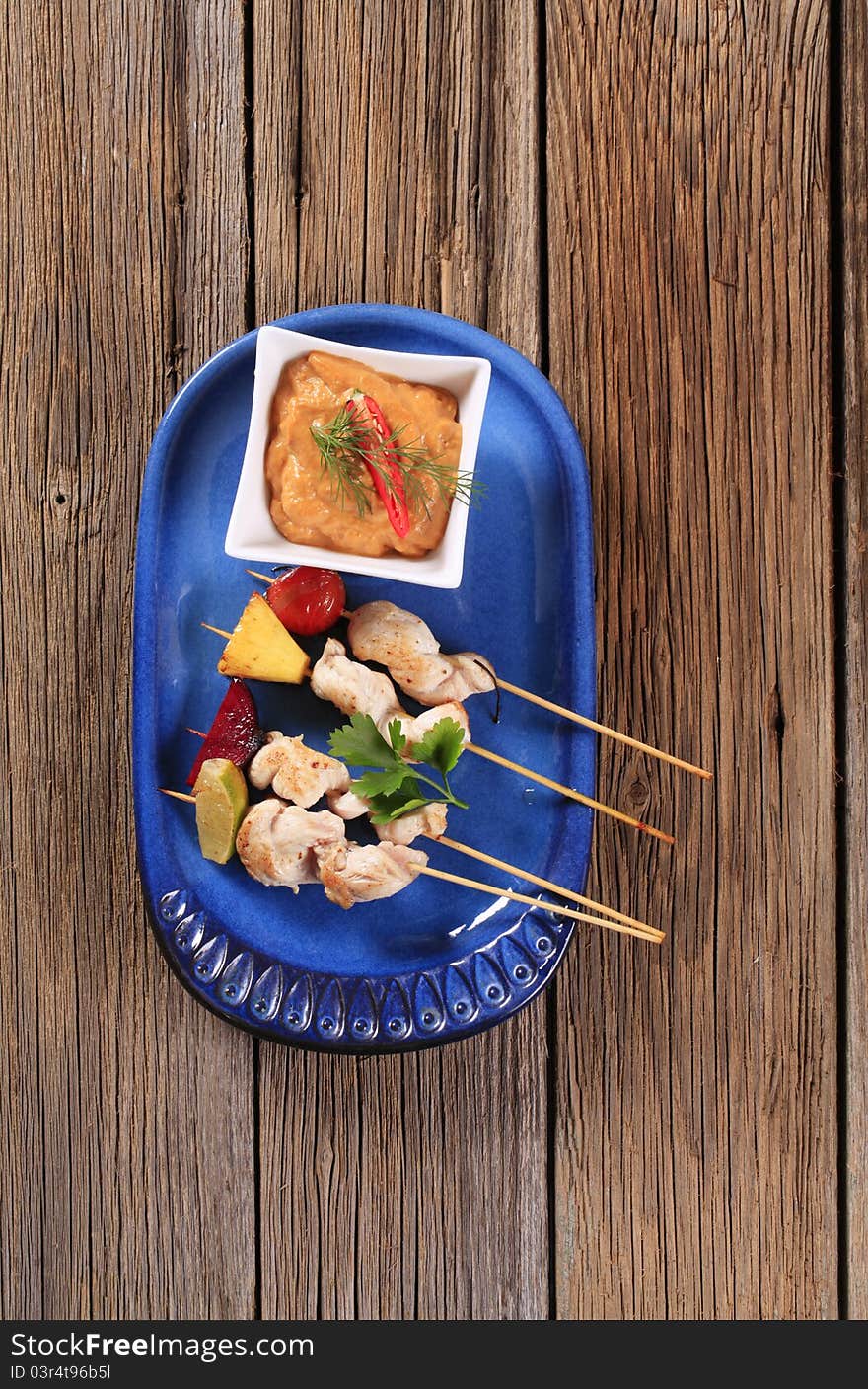 Chicken skewers and vegetable dipping sauce