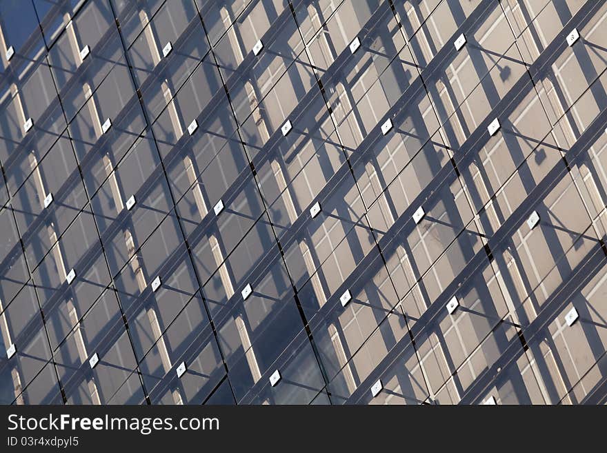 Coating of building with glass