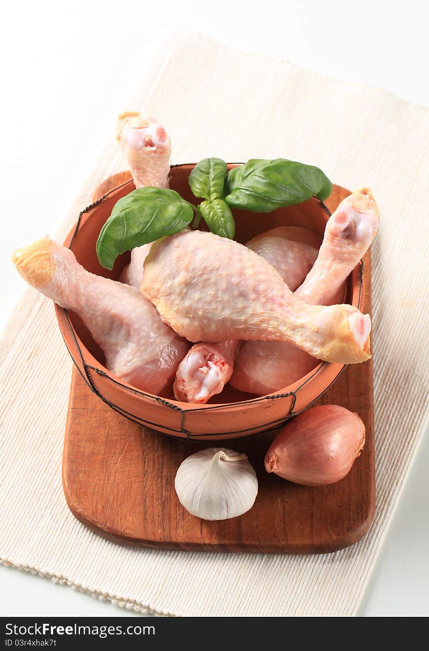 Raw chicken drumsticks