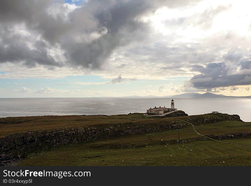 Cliffs and lighthouse, scotland