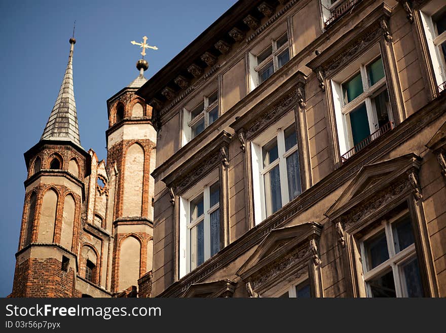 Architectural details of an old house and medieval church on Saint Mary in Torun, Poland. Architectural details of an old house and medieval church on Saint Mary in Torun, Poland