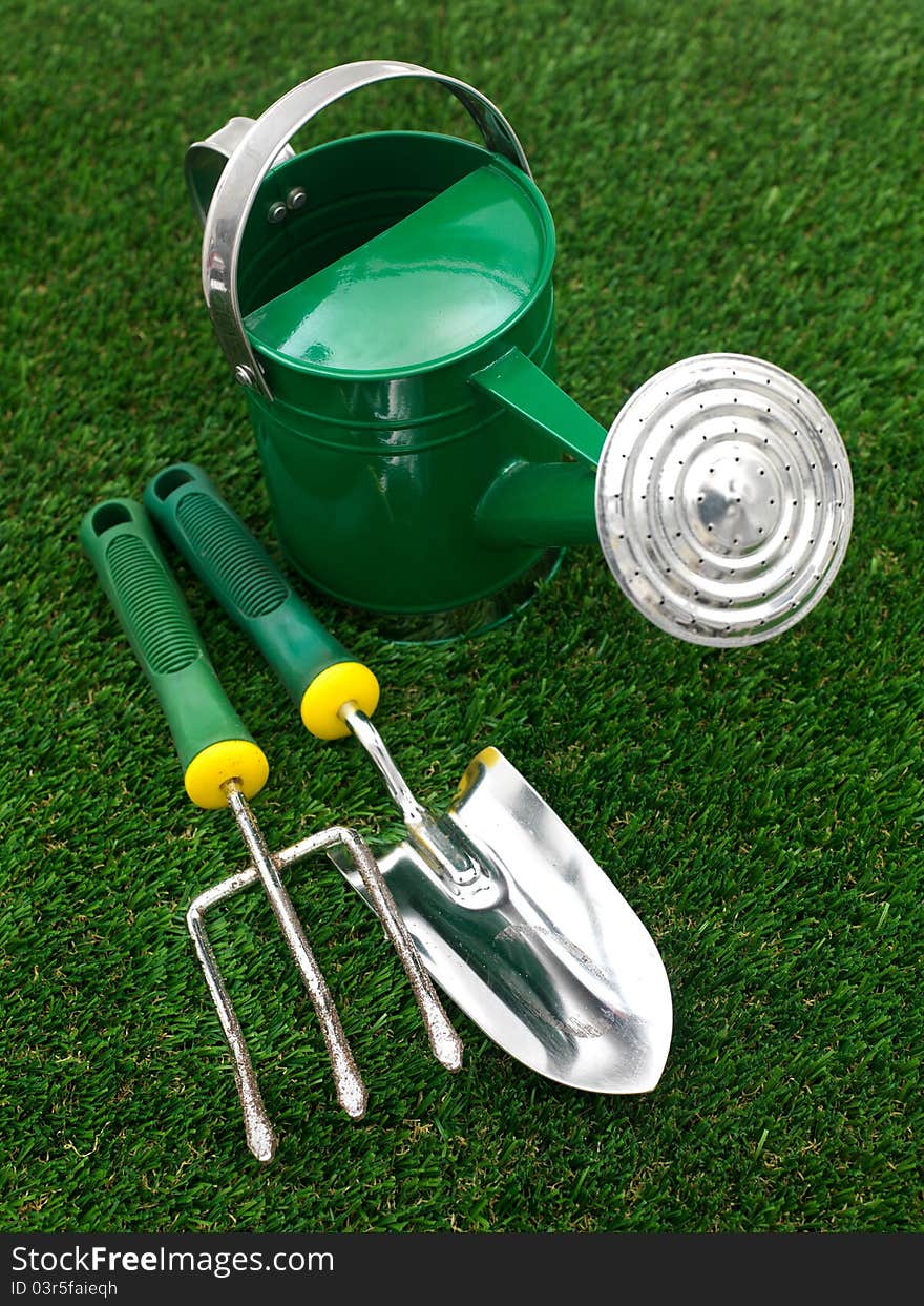 A watering can against a white background