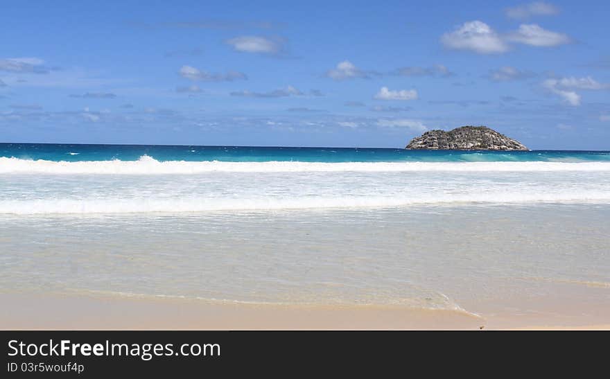 Beach with rock on seychelles on Mahe