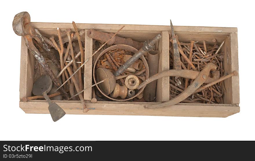 Antique rusty tools on an old wooden desk