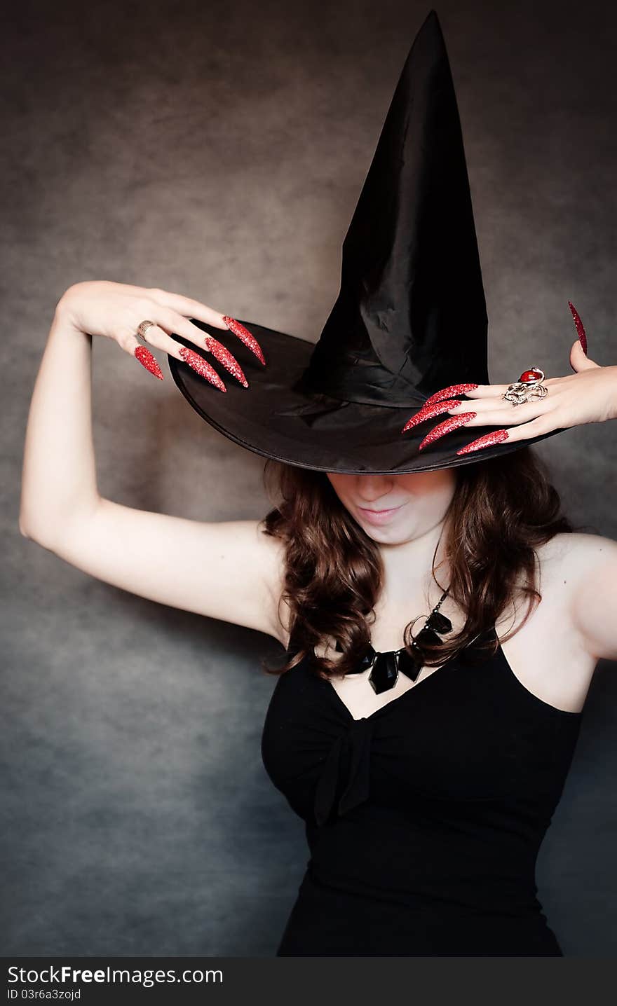 Witch With Black Hat And Long Nails