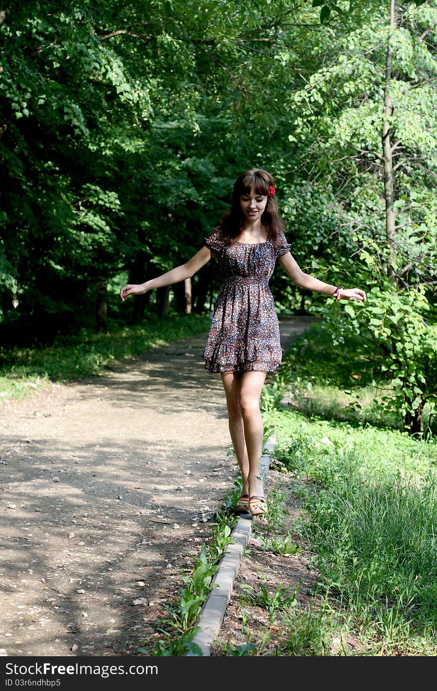 Girl walking outdoor in summer