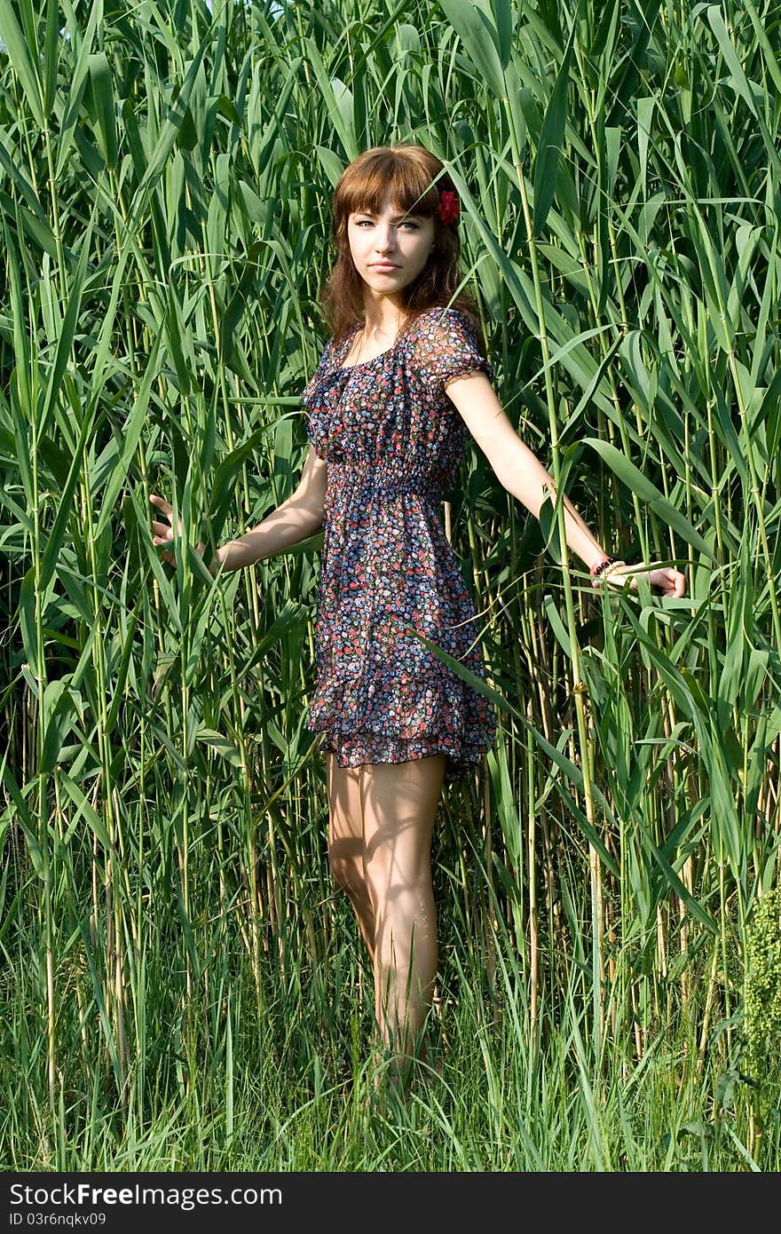 Girl walking outdoor in summer. Girl walking outdoor in summer