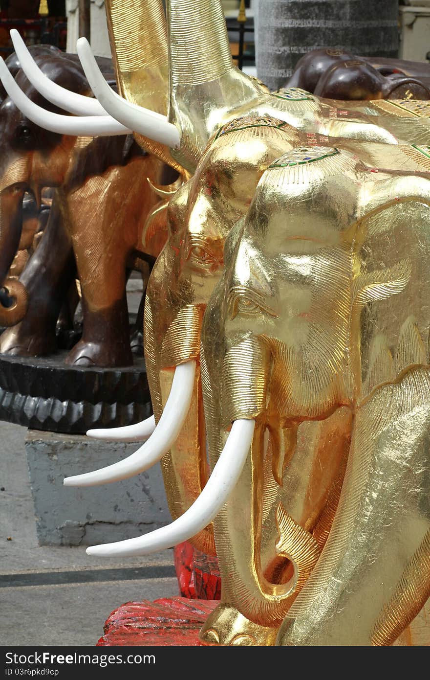 Wooden gilded elephants at Erawan shrine, Bangkok, Thailand. Wooden gilded elephants at Erawan shrine, Bangkok, Thailand