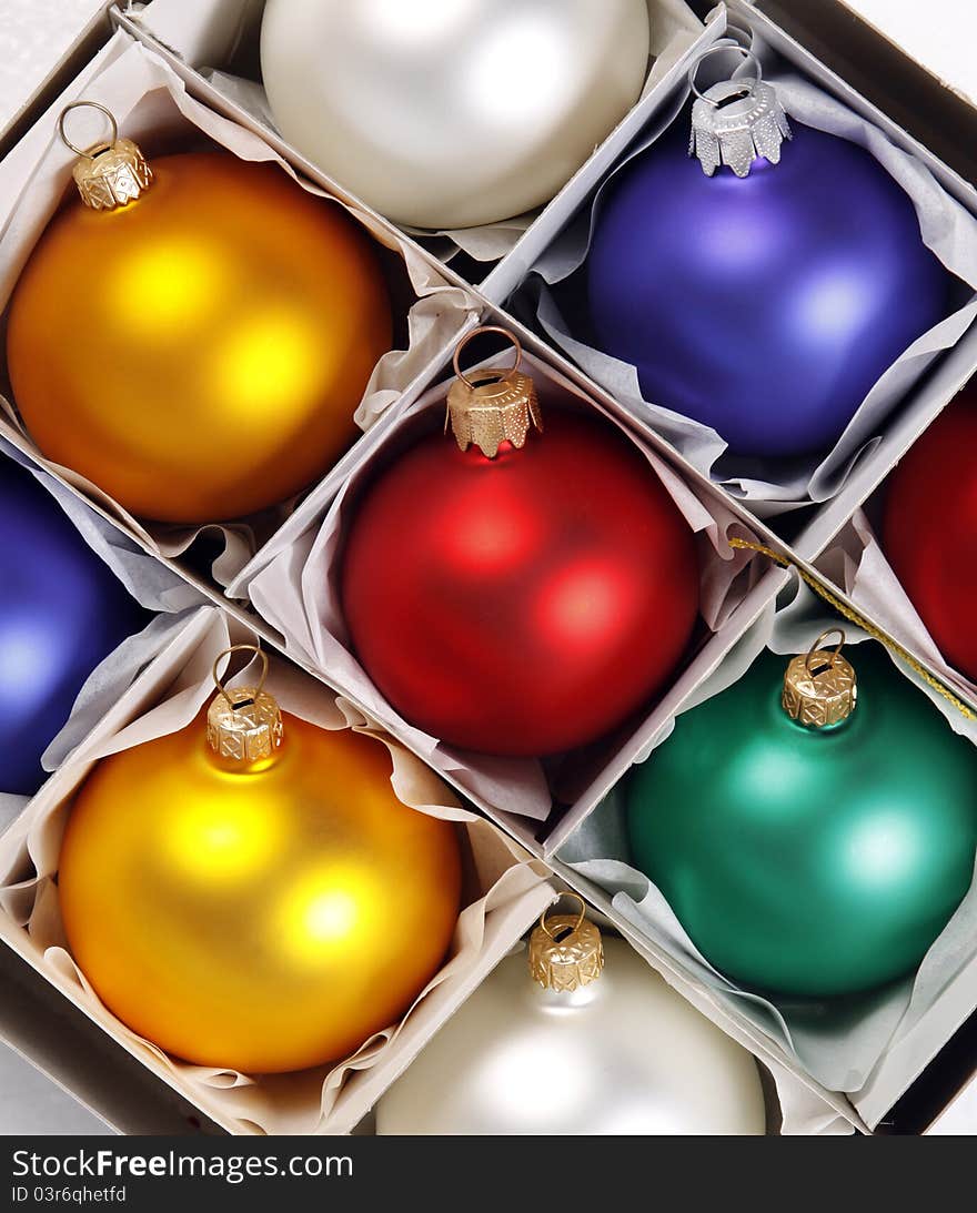 Colorful baubles in the white box